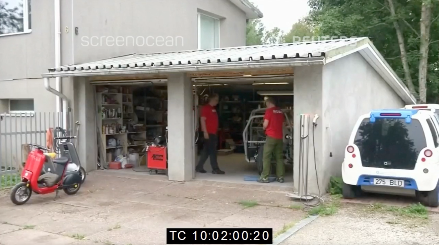 Ivo Ustav in Merilo's garage with Nobe and E-Roll